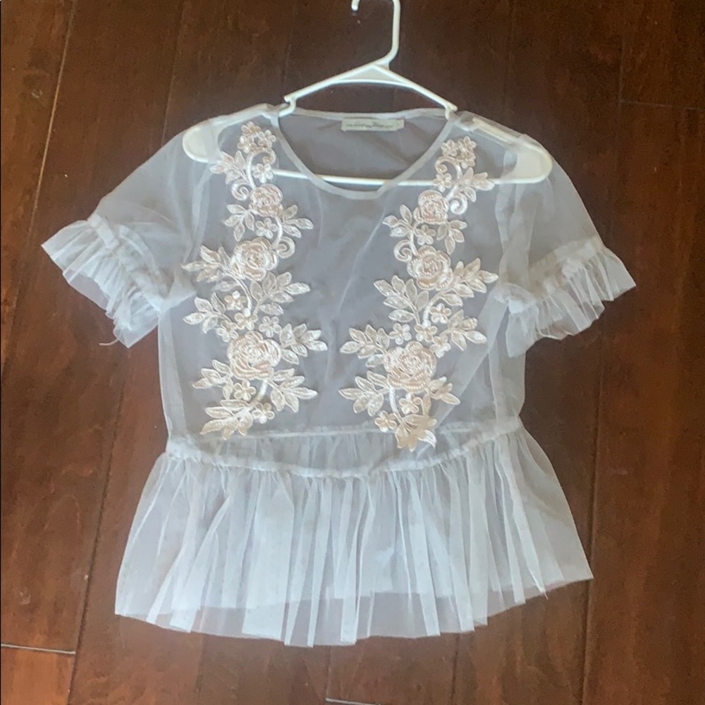 Light Blue mesh tshirt. Slightly worn